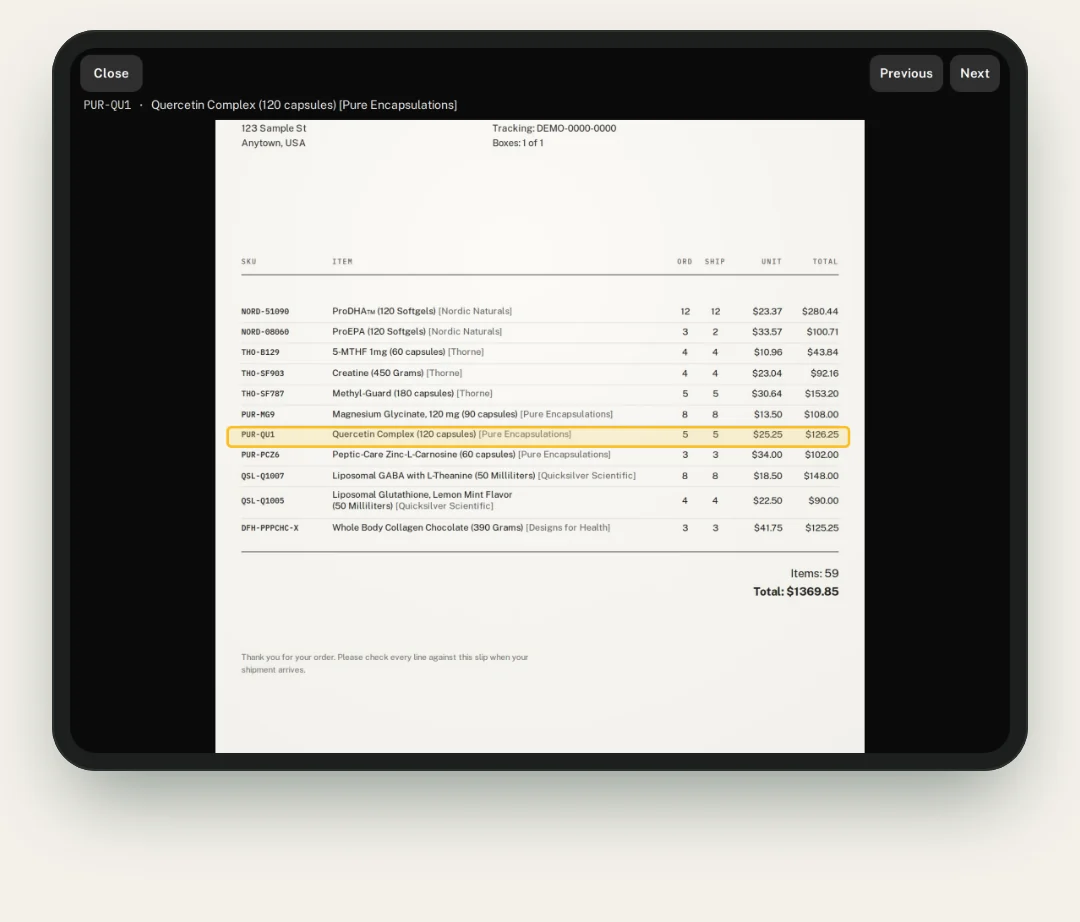 The packing slip photo opened on an iPad with one line item boxed in yellow, and Previous and Next buttons to step through lines.